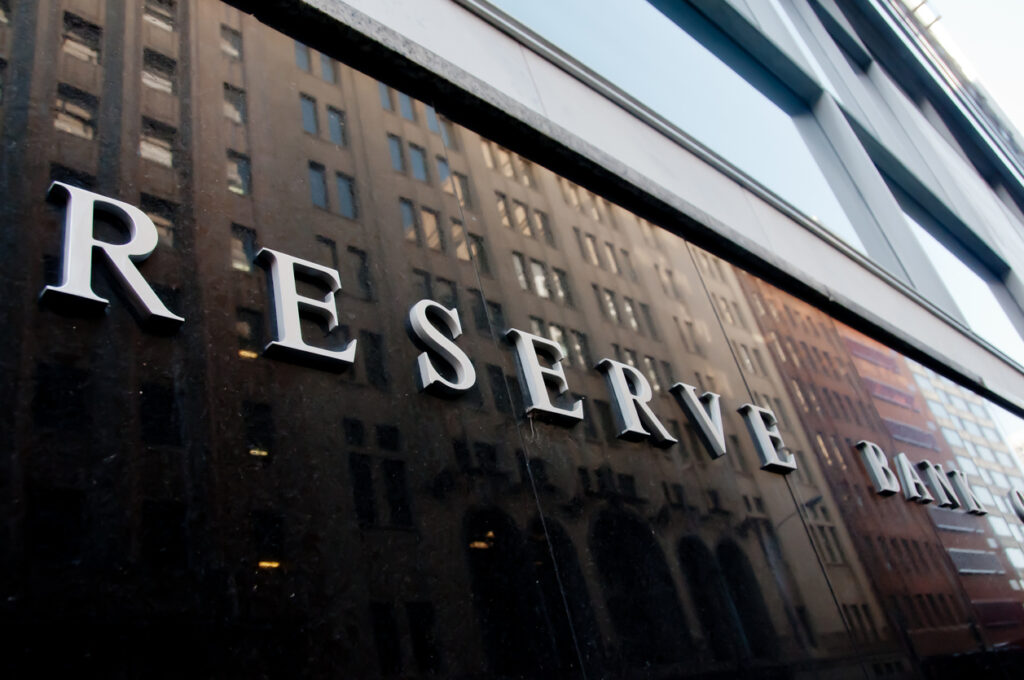 Reserve Bank of Australia building name on black stone wall in the center of Sydney NSW Australia.