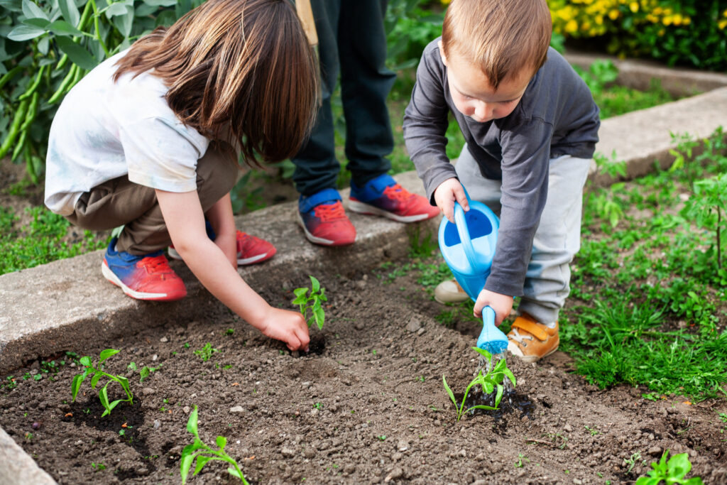 kids gardening at their new house